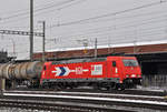 Lok 185 588-9 durchfährt den Bahnhof Pratteln. Die Aufnahme stammt vom 16.01.2017.