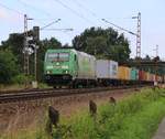 185 389-4 mit Containerzug in Fahrtrichtung Nienburg(Weser). Aufgenommen in Eystrup am 23.07.2015.