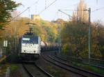 186 182-2 von Railpool und die Cobra 2823  und fahren durch Aachen-Schanz mit einem langen Kesselzug aus Antwerpen-BASF(B) nach Ludwigshafen-BASF(D) und kommen aus Richtung Aachen-West in Richtung