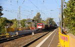 186 333-1 DB-Schenker kommt die Kohlscheider-Rampe hoch aus Richtung Neuss,Herzogenrath mit einem Schrottzug aus Köln-Kalk(D) nach Genk-Goederen(B) und fährt durch Kohlscheid in Richtung Richterich,Laurensberg,Aachen-West. 
Aufgenommen vom Bahnsteig 1 in Kohlscheid. 
Bei Sommerwetter am Nachmittag vom 20.9.2018.
Und das ist mein 9100tes Bahnbild bei http://WWW.Bahnbilder de 