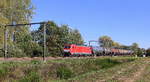 186 338-0 DB-Schenker kommt mit einem Ölleerzug aus  Basel(CH) nach Antwerpen-Petrol(B) und kommt aus Richtung Aachen-West(D),Montzen(B),Vise(B),Tongeren(B),Hasselt(B) und fährt durch Lummen-Linkhout(B) in Richtung Diest(B),Antwerpen(B). 
Aufgenommen in Lummen-Linkhout(B). 
Bei schönem Herbstwetter am Nachmittag vom 13.10.2018. 