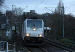 186 455-2 von Lineas/Railpool kommt aus Richtung Aachen-West mit gemischten Güterzug aus Antwerpen-Noord(B) nach Köln-Gremberg(D) und fährt durch Aachen-Schanz in Richtung Aachen-Hbf,Aachen-Rothe-Erde,Stolberg-Hbf(Rheinland)Eschweiler-Hbf,Langerwehe,Düren,Merzenich,Buir,Horrem,Kerpen-Köln-Ehrenfeld,Köln-West,Köln-Süd. Aufgenommen vom Bahnsteig von Aachen-Schanz.
Bei Regenwolken am Nachmittag vom 19.12.2018.