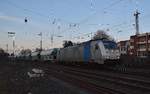 186 421-7 mit einem leeren Kalkwagenzug gen Belgien fahrend durch Rheydt Hbf. 21.1.2019