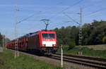 186 333-1 von DB-Schenker kommt mit einem Landrover-Autozug aus Gelsenkirchen-Bismarck(D) nach Zeebrugge-Ramskapelle(B) und kommt aus Rheydt-Hbf,Wickrath,Beckrath,Herrath,Erkelenz,Baal,Hückelhoven-Baal,Brachelen,Lindern,Süggerath,Geilenkirchen,Frelenberg,Zweibrüggen,Übach-Palenberg,Rimburg und fährt durch Hofstadt in Richtung Herzogenrath, Kohlscheid,Richterich,Laurensberg,Aachen-West. 
Aufgenommen in der Nähe von Finkenrath.
Bei Sommerwetter am 15.9.2019.