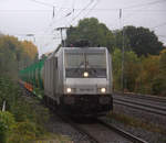 186 386-9 von Akiem/Lineas kommt als Umleiter aus Richtung Aachen-West mit einem BASF-Tankcontainerzug aus Antwerpen-BASF(B) nach Ludwigshafen-BASF(D) und fährt durch Kohlscheid in Richtung