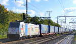 HSL Logistik GmbH, Hamburg [D]  mit der Railpool Lok  186 299-4  [NVR-Nummer: 91 80 6186 299-4 D-Rpool] und KLV-Zug am 13.10.21 Durchfahrt Bf. Golm (Potsdam).