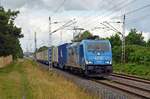 Mit einem Containerzug der polnischen Spedition Loco Trans-Sped rollt 186 941 der LTE am 27.06.23 durch Wittenberg-Labetz Richtung Falkenberg(E).