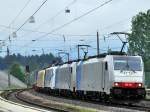 Der mit 3 Zuglokomotiven und einer Wagenlok verkehrende 43128 bei der Durchfahrt in Brixlegg am 20.5.2010.