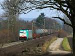 Frhling am Gemmenicherweg an der Rampe der Montzenroute. Cobra 186 197 (2805) am 22.03.2013 mit einem gemischten Gterzug von Aachen West nach Belgien