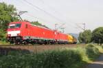 186 340-6 in Doppeltraktion mit einer 185 und gemischtem Gterzug in Fahrtrichtung Sden. Aufgenommen zwischen Eschwege und Albungen am 19.06.2013.