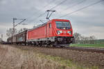 187 140 ist mit einen gemischten Güterzug bei Friedlandzu unterwegs,gesehen am 11.04.2018.