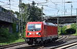 DB Cargo AG [D] mit ihrer  187 104  [NVR-Nummer: 91 80 6187 104-5 D-DB] am 11.07.23 Höhe Bahnhof Hamburg-Harburg. Eigentlich war ich etwas verwundert, ich dachte die wäre aus diesem Nummernkreis auch an die MRCE veräußert worden, wie man sieht also nicht?