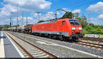 189 019-3 (Siemens ES64F4) ist mit der Kesselzug-Leistung von den Buna-Werken nach Děčín (CZ) betraut und fährt auf Höhe des Hp Leipzig-Thekla Richtung Leipzig-Engelsdorf.