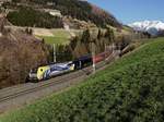 Die 189 912 und die ES 64 F4-032 mit einem Schrottzug am 07.04.2018 unterwegs bei Matrei am Brenner.