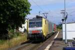 In Dutenhofen(bei Wetzlar) ist die MRCE-Dispolok ES 64 F4-097   (E 189 997 SE) mit einem Gterzug in richtung Ruhrgebiet unterwegs.Die E 189 997 hat noch die alte Dispolok-Lackierung.
