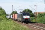 ES 64 F4-991 mit einem Containerzug in Limmer am 02.06.2009