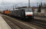 189 934-3 von MRCE fhrt am 15.12.2011 mit einem Containerzug durch Mnchen Heimeranplatz Richtung Mnchen Ost.