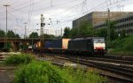 189 983 von MRCE  Dipolok kommt aus Richtung Kln,Aachen-Hbf mit einem langen Containerzug aus Gallarate(I) nach Antwerpen-Oorderen(B) und fhrt in Aachen-West ein in der Abendsonne und Wolken am Abend vom 3.7.2013.