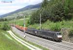 MRCE's E189 986 passes Matrei am Brenner whilst working a southbound freight train, 23 May 2013