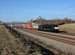 Die ES 64 F4-034 mit einem KLV-Zug am 18.03.2016 unterwegs bei Hebertshausen.