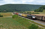 ES 64 F4-113 der MRCE mit einem Containerzug bei Harrbach Richtung Würzburg, 23.07.2015