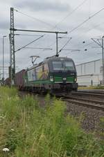 Mit einem Mischer am Haken kommt die ELL 193 203 die für LTE fahrend durch Groß Gerau. 16.7.2017