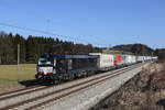 193 646 mit einem  EKOL-Zug  aus Salzburg kommend am 25. Februar 2021 bei Grabenstätt im Chiemgau.