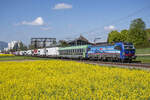 193 529  Neckar  ist mit einer RoLa unterwegs in den Süden, aufgenommen bei Herzogenbuchsee am 01.05.2022.