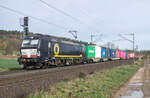 X 4 E-855 (193 855-4) mit einem Containerzug am 26.03.2024 bei Kerzell.