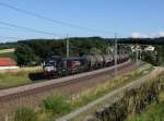 Die X 4 E-872 mit einem Kesselzug am 06.07.2014 unterwegs bei Haiding.