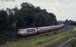 Elegant legt sich 103239 mit dem IC 531 Mercator in Vehrte am 15.8.1987 um 16.25 Uhr auf der Fahrt in Richtung Hamburg in die Kurve.