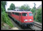 110 387 mit einem Planmigen RE4  Wupper-Express  Umlauf am 28.Juli.2007 kurz hinter dem Bf Geilenkirchen.