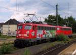 Nachdem die beiden 110er die Autoslaaptrains von Basel nach Venlo gebracht haben, kommen 110 491-8 mit Ferrero Werbung und 110 489-2 auf dem Weg nach Kln durch Mnchengladbach.