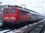 BR110 243-3(DB Regio NRW GmbH Dortmund)mit IC1809 von Rostock Hbf.nach Kln Hbf.kurz vor der Abfahrt im Rostocker Hbf.(15.02.09)