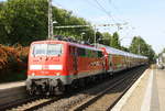 111 061 DB  kommt mit dem RE4 von Dortmund-HBf nach Aachen-Hbf und kommt aus Richtung Neuss-Hbf,Mönchengladbach-Hbf,Rheydt-Hbf,Wickrath,Beckrath,Herrath und fährt in Erkelenz ein und