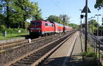 111 169 DB Zieht einen RE4 von Aachen-Hbf nach Dortmund-Hbf kommt aus Richtung Aachen-West,Laurensberg,Richterich, und fährt durch Kohlscheid in Richtung Herzogenrath,Mönchengladbach. 
Aufgenommen von Bahnsteig 2 in Kohlscheid. 
Bei Sommerwetter am Nachmittag vom 6.5.2018.