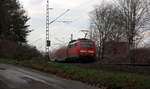 Ein Nachschuss von der 111 113 DB schiebt den RE4 aus Aachen-Hbf nach Dortmund-Hbf und kommt aus Richtung Aachen-Hbf,Aachen-Schanz,Aachen-West,Laurensberg,Richterich,Kohlscheid,Herzogenrath und fährt durch Worm in Richtung Hofstadt,Finkenrath,Rimburg-Übach-Palenberg, Zweibrüggen,Frelenberg,Geilenkirchen,Süggerath,Lindern,Brachelen,Hückelhoven-Baal,Baal,Erkelenz,Herrath,Beckrath,Wickrath. 
Aufgenommen von der Grenzstraße in Herzogenrath,Worm. 
Bei Regenwolken am Nachmittag vom 28.2.2019.