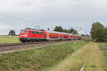 111 096 der Deutschen Bahn AG war am 13. Juni 2020 mit dem Regionalexpress 10418 von Dortmund Hauptbahnhof nach Aachen Hauptbahnhof unterwegs, hier in Höhe der Einfahrsignale der Gegenrichtung des Bahnhof zu Lindern.