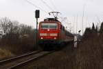 111 030-3 eilt an einem trben Nachmittag mit ihrer Regionalbahn Richtung Donauwrth.