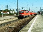 111 216 schiebt ihre Dosto-Ganitur in Richtung Mnchen HBf.