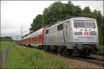 Die Mnchnerin 111 027  850 Jahre Mnchen  ist bei Vogl mit dem RE 30013  MNCHEN-SALZBURG-EXPRESS  nach Salzburg Hbf unterwegs. (09.07.2008)