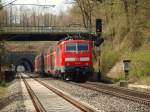 RE9 wird am 07.04.2010 von 111 128 hinter Stolberg die lange Gerade Richtung Eilendorf geschoben.