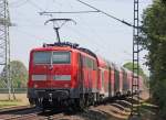 111 111 schiebt ihren RE10419 nach Dortmund, hier an Km 29.0 zwischen Geilenkirchen und Lindern, 22.5.10