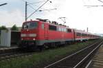Die 111 205-1 zog am 25.6.10 die RB 34880 nach Gemnden(Main) in den Bahnhof Himmelstadt.