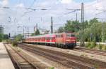 111 033-7 mit RB 30101 Mnchen Hbf - Rosenheim am 30.07.2010 bei der Durchfahrt Mnchen-Heimeranplatz