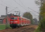 111 151-7 mit dem RE10414 nach Aachen Hbf hier am Km 29.0 kurz vor dem Bahnhof Geilenkirchen, 8.4.11
