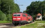 RE 79016 (bersee-Mnchen Hbf) mit Schublok 111 123-6 in Aling 4.6.11