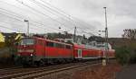 111 015-4 mit RE 9 (Rhein-Sieg-Express) Aachen - Kln - Siegen, hat hier am 04.12.2011 den Bahnhof Betzdorf/Sieg verlassen und fhrt weiter in Richtung Siegen.