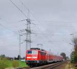 111 117 mit RE4 bei Sggerath am 30.3.12. Fotostandpunkt ist der Ehmalige Ruf-bahnbergang