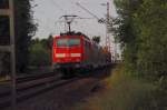 Die 111 155 beim Schieben eines RE4 Zuges nach Dortmund.....am Abend der 5.6.2012 hier bei Herrath.